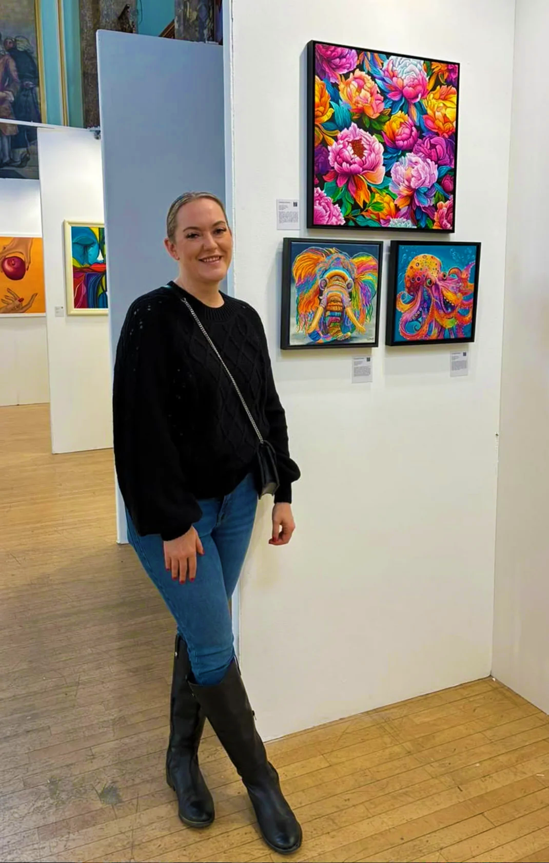 Danielle Cowdrey at her colorful art exhibit - Houston colorful wall art artist